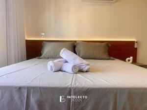 Ένα ή περισσότερα κρεβάτια σε δωμάτιο στο Infinity