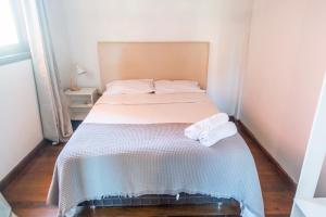 Ένα ή περισσότερα κρεβάτια σε δωμάτιο στο Altillo privado con desayuno artesanal en pleno centro