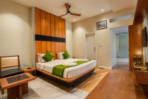 Ένα ή περισσότερα κρεβάτια σε δωμάτιο στο PARK SIGNATURE HOTELS - Royal Benza +85 φωτογραφίες