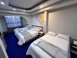 Ένα ή περισσότερα κρεβάτια σε δωμάτιο στο Wary Nayra Hotel & Spa