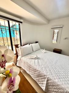 Postel nebo postele na pokoji v ubytování Hotel Sleep Well