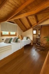 Ένα ή περισσότερα κρεβάτια σε δωμάτιο στο Luxury Rural Cuenca - Villas