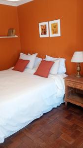 Postel nebo postele na pokoji v ubytování Chalet en Barrio Parque + 9 fotografií