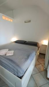 Ένα ή περισσότερα κρεβάτια σε δωμάτιο στο Sea Garden - San Bartolomeo al Mare