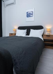 Ένα ή περισσότερα κρεβάτια σε δωμάτιο στο Escape Studio 4 Pollux Militari