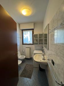 Koupelna v ubytování Appartamento Amendola + 8 fotografií