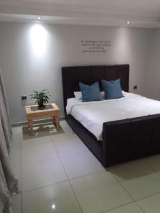 Giường trong phòng chung tại Nurest