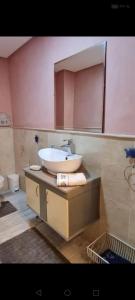 a bathroom with a sink and a mirror at guiliz in Marrakech +12 photos