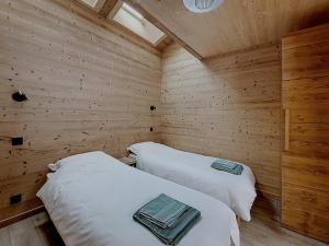 Giường trong phòng chung tại Gervonne 2