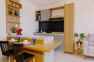 Køkken eller tekøkken på Studio completo c piscina, Wi-Fi e boa localização