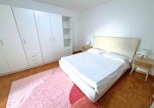 Ένα ή περισσότερα κρεβάτια σε δωμάτιο στο Dimora Porta Nuova - Sostify +2 φωτογραφίες