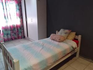 Giường trong phòng chung tại Nurest