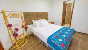 Postel nebo postele na pokoji v ubytování Casona MICA'S HOUSE + 5 fotografií