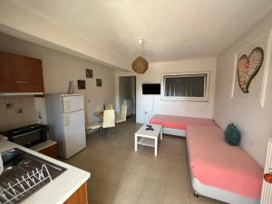 Η κουζίνα ή μικρή κουζίνα στο Orange House