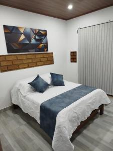 Postel nebo postele na pokoji v ubytování Cabaña