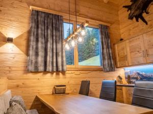 a dining room with a table and a window at Alte Mühle in Nauders