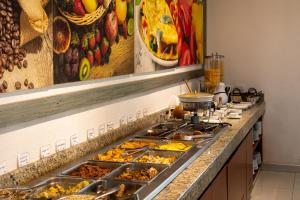 a buffet line with many different types of food at Mesón de la Luna Hotel & Spa in Mérida +120 photos