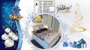 a christmas flyer with a bed in a room with christmas decorations at Vi’studio in Sibiu
