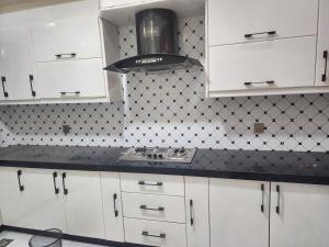 Kuchyň nebo kuchyňský kout v ubytování Mehran House