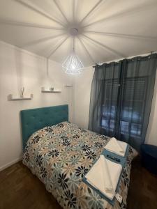 En eller flere senge i et værelse på Apart Lisbon Airport