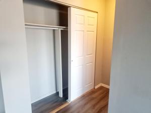 an empty room with a closet with a door at Long term 1BR w Balcony & Parking Near Philly in Jenkintown +12 photos