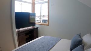 Μια τηλεόραση ή/και κέντρο ψυχαγωγίας στο Sweet Frutillar Hostel