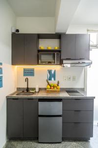 Kuchyň nebo kuchyňský kout v ubytování 2 habitaciones con baño privado y cocina equipada en el centro de Asunción