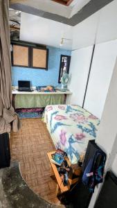 Ένα ή περισσότερα κρεβάτια σε δωμάτιο στο Chez Hinano SIKI