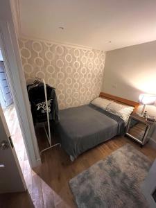 Ένα ή περισσότερα κρεβάτια σε δωμάτιο στο Double Ensuite in Prestige Location