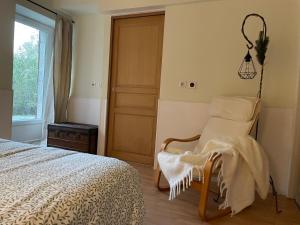 Ένα ή περισσότερα κρεβάτια σε δωμάτιο στο Appartement Bayonnais, au cœur de la verdure