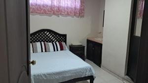 Postel nebo postele na pokoji v ubytování Hotel Rio Escondido Don Arturito