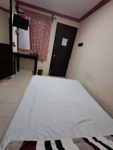 Postel nebo postele na pokoji v ubytování Hotel Rio Escondido Don Arturito