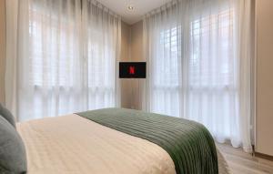 Ένα ή περισσότερα κρεβάτια σε δωμάτιο στο Madrid Apt 4 rooms 4 bathrooms