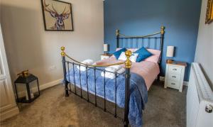 Ένα ή περισσότερα κρεβάτια σε δωμάτιο στο Penrhyllan