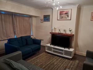 Posezení v ubytování Cosy 2 Bedroom Luxury House