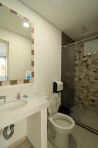 Koupelna v ubytování El Oscar Hotel