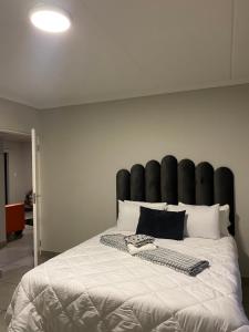 Ένα ή περισσότερα κρεβάτια σε δωμάτιο στο Unmatched Stays