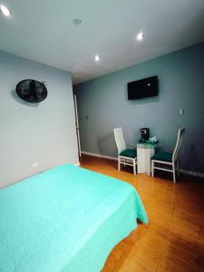 TV a/nebo společenská místnost v ubytování Marérooms