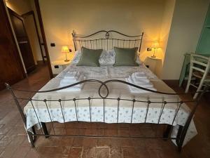 Giường trong phòng chung tại Podere Casanova - Gilvus Relax in San Gimignano