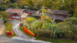 an aerial view of a house with a garden at Kantarrana Casa de Campo in Jardin