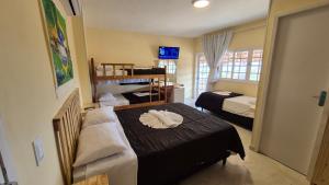 Ένα ή περισσότερα κρεβάτια σε δωμάτιο στο Pousada Ceará - Porto das Dunas +186 φωτογραφίες