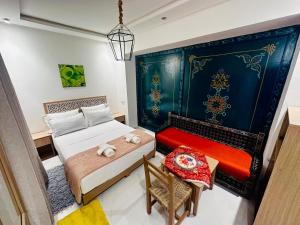 Postel nebo postele na pokoji v ubytování Hotel Cecil