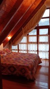 Кровать или кровати в номере Duplex Nou Vielha Esqui
