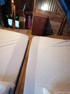 Ένα ή περισσότερα κρεβάτια σε δωμάτιο στο Cabaña en Barra de Valizas