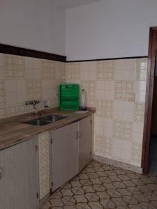 Kuchyň nebo kuchyňský kout v ubytování Cosquin centro con 2 cocheras