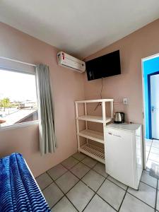 Μια τηλεόραση ή/και κέντρο ψυχαγωγίας στο Morada da Marta +44 φωτογραφίες