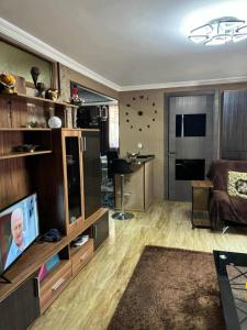 O bucătărie sau chicinetă la Dachi Apartment