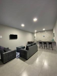 Μια τηλεόραση ή/και κέντρο ψυχαγωγίας στο AP Quatro Estações