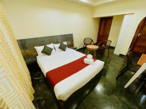 Ένα ή περισσότερα κρεβάτια σε δωμάτιο στο Upavan Villa- 4 Km Away From Aluva Railway Station