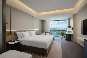 TV a/nebo společenská místnost v ubytování Crowne Plaza Kunshan East by IHG